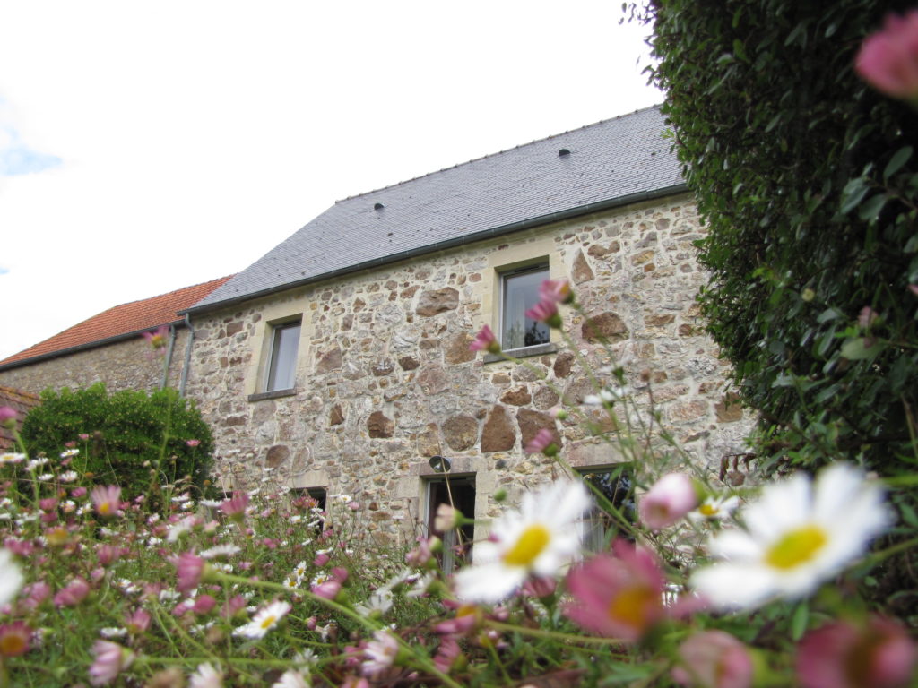 A view of the house from the bottom of the west oriented terace